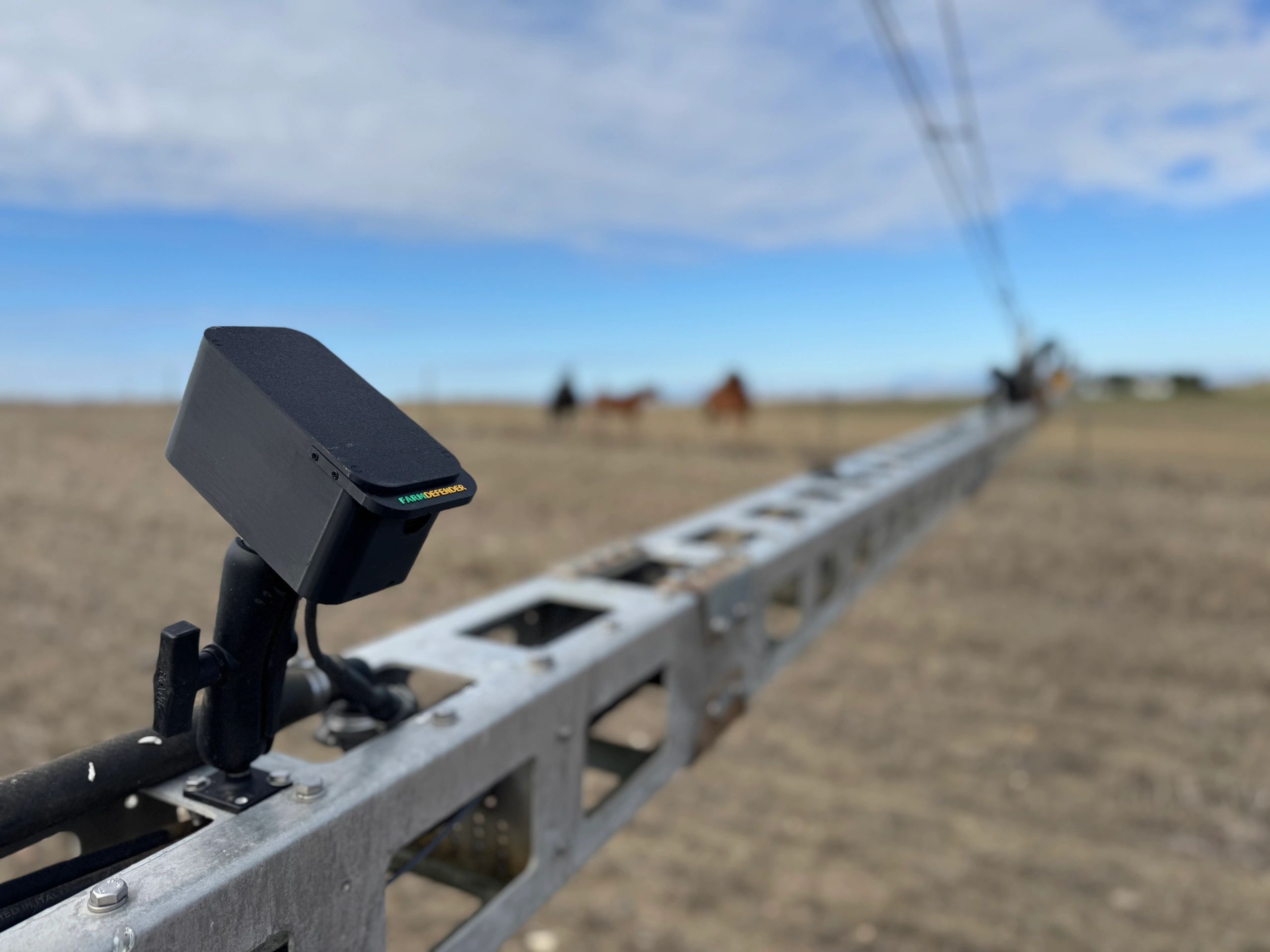 FarmDefender camera mounted on a sprayer boom